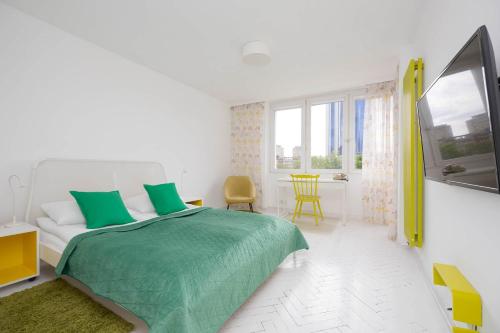 Colorful Two Bedroom Apartment Platynowa Warsaw Perfect for Remote Work by Noclegi Renters