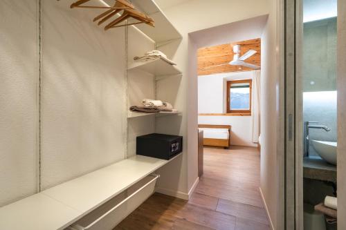 a bathroom with a shower and a sink at Hotel Deva in Riva del Garda