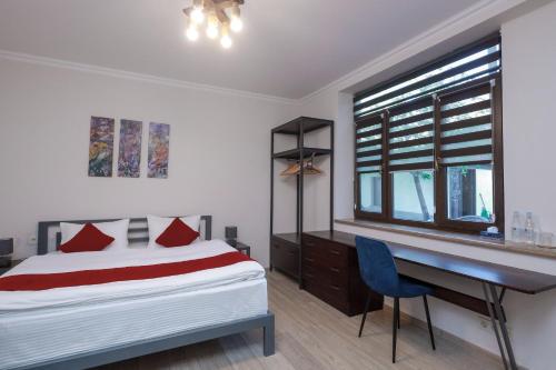 Llit o llits en una habitació de Syune Mini Hotel