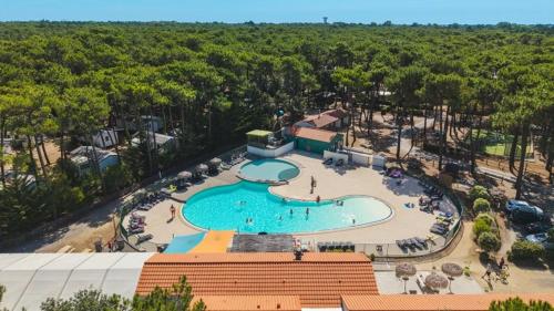 ZEcamping 3 sous les Pins - Accès direct Plage - MH TV Plancha