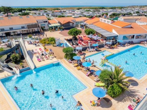 ZEcamping 5 - Parc Aqua - Plage à 150 m - MH TV Plancha - Club enfant
