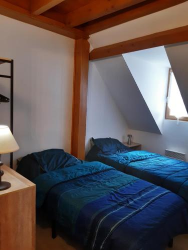 Llit o llits en una habitació de Les Gentianes