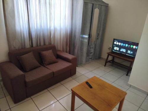 a living room with a couch and a coffee table at Manor Rentals in Potchefstroom
