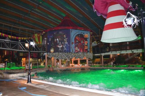 a large swimming pool with a pirate ship at Chatka 428 a 429 - Tatralandia in Liptovský Mikuláš