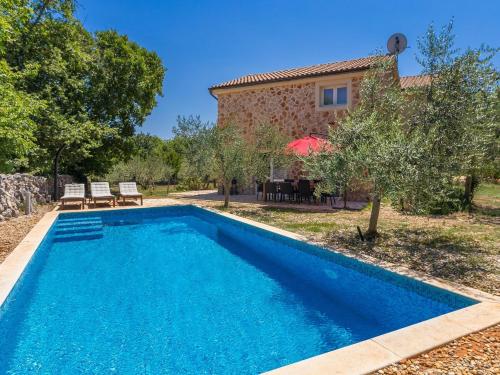 Holiday house ALYSSA with pool on Krk island, sand beach