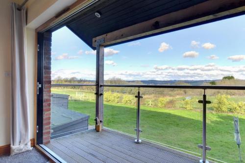 a large glass door leading to a balcony with a view at 2 Bed in Cardiff oc-91710 in Cardiff