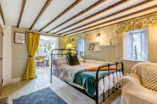a bedroom with a bed in a room at 5 Bed in Blofield oc-s33037 in Blofield