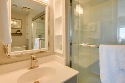 a bathroom with a sink and a glass shower at Beach, Pool & Ocean View! North Myrtle Beach Condo in Myrtle Beach