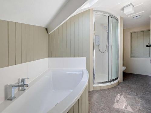 a bathroom with a sink and a shower at 4 Bed in Hope Valley oc-pk939 in Curbar