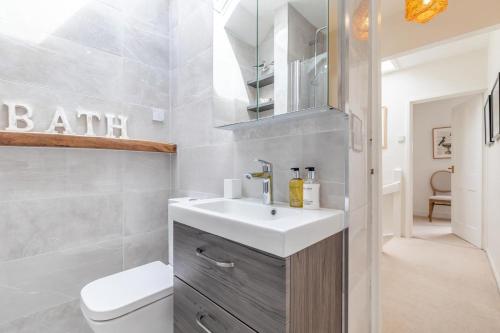 a bathroom with a sink and a toilet at 2 Bed in Baslow oc-h32721 in Baslow