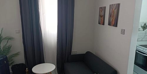 Kuchyň nebo kuchyňský kout v ubytování Cozy & Warm Studio