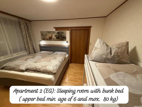 a bedroom with two beds in a room at Angi's Apartment in Sankt Lorenzen ob Murau
