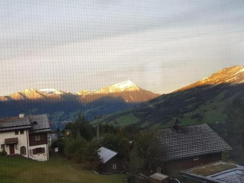 a view of snow covered mountains from a house at by Interhome in Sattel