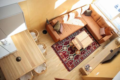 an overhead view of a living room with a couch at A63 Premium apartment located in hotel Vucko-private host in Jahorina