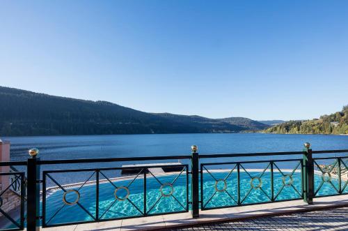 a view of a lake from a bridge at Treschers Schwarzwald Hotel in Titisee-Neustadt