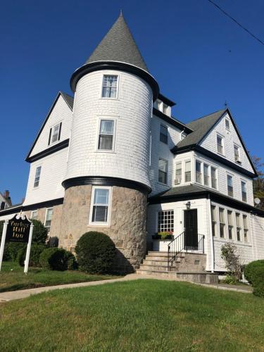 a large white house with a tower on top at Turkey Hill Inn in Summit