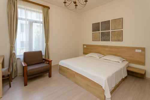 Postel nebo postele na pokoji v ubytování Mais Guest House