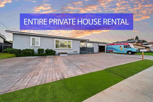 a house with a truck parked in a driveway at Entire Private Home with 4 Bedrooms 2 Bathrooms, King Bed, 80 TV, Gated Yard, Ranch Style, Available Now in El Cajon