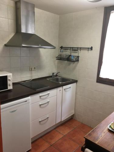 Kuchyň nebo kuchyňský kout v ubytování Hostal Rural La Botería