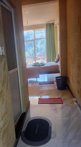 Llit o llits en una habitació de Sunray Homestay