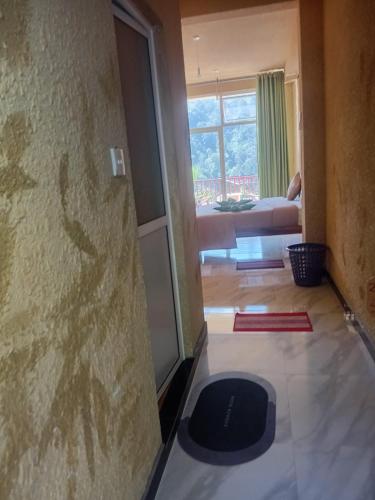 Llit o llits en una habitació de Sunray Homestay