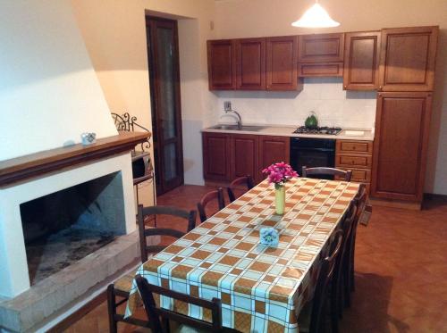 Kuchyň nebo kuchyňský kout v ubytování APPARTAMENTI Villa Marianna