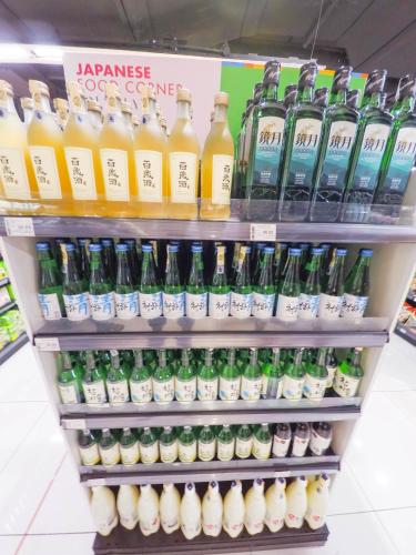 a display of bottles of drinks in a store at Luxury Condominium at Loft Imago in Kota Kinabalu