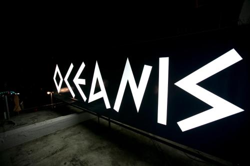 a sign that says xanax on the side of a building at Oceanis Hotel in Kavala