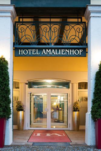 a hotel entrance with a hotel administrator sign above a door at Boutique-Hotel Amalienhof in Weimar