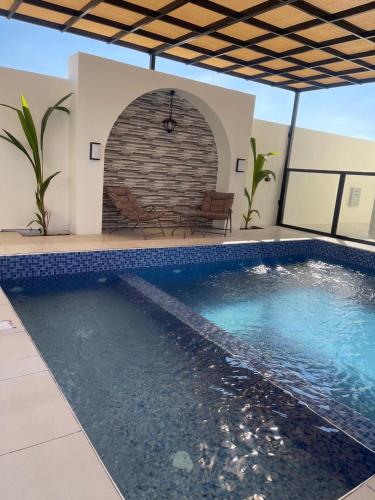 Piscina a أستراحة بانا o a prop