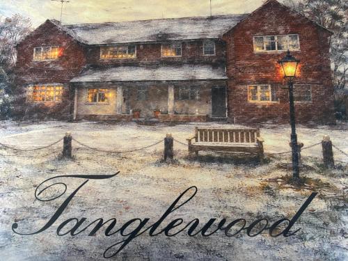 a painting of a house with a bench and a street light at Tanglewood Gatwick Bed & Breakfast in Crawley