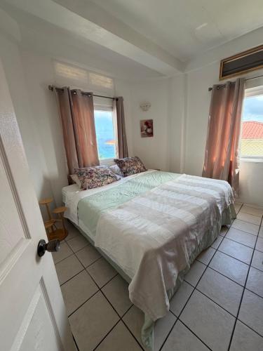 Llit o llits en una habitació de Peace Seekers Suite 1