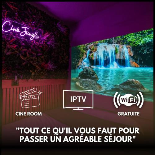 a banner with a waterfall and a sign that reads tourlez evil yours fault pour at La Canopée Jurassienne in Les Rousses