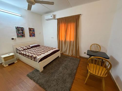 Vuode tai vuoteita majoituspaikassa Résidence huele