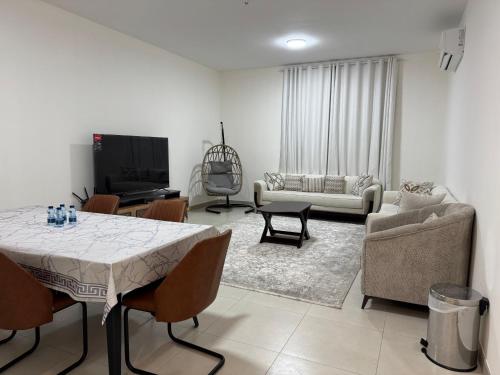 Et opholdsområde på Sohar Square Apartment