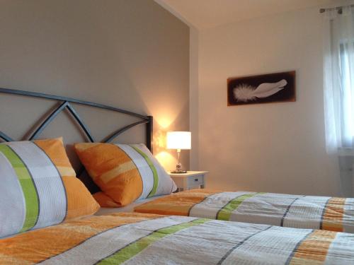 Postel nebo postele na pokoji v ubytování Fewo Vulkaneifel