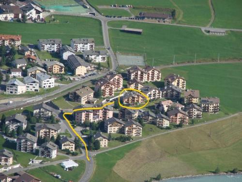 an aerial view of a road with a yellow circle at Apartment Culaischem 1 by Interhome in Zuoz