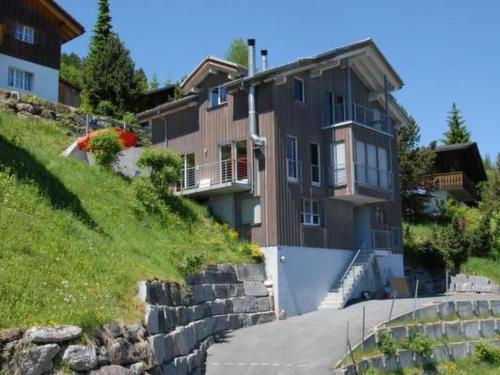a house on the side of a hill at Apartment Studio Flumserberg by Interhome in Flumserberg