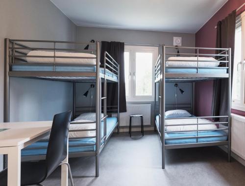 
A bunk bed or bunk beds in a room at Partille Vandrarhem

