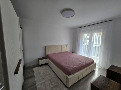 Llit o llits en una habitació de Matin apartment