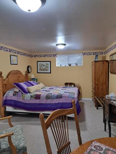 Llit o llits en una habitació de Carrousel Bed & Breakfast