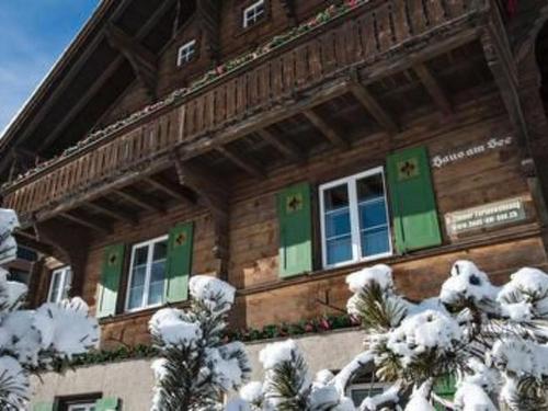 Apartment Chalet Haus am See by Interhome