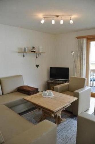 Apartment Chesa Semnadur H8 by Interhome