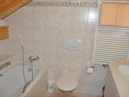 Apartment Chesa Semnadur H8 by Interhome