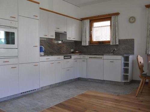 Apartment Chesa Semnadur H2 by Interhome