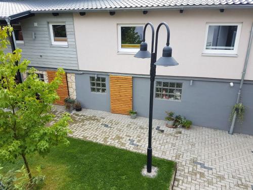 a street light in front of a house at Apartment Mia by Interhome in Fritzlar