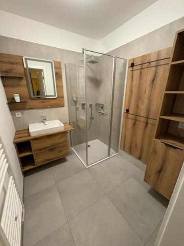 a bathroom with a shower and a sink at Apartment Lisa Hinterstoder in Hinterstoder