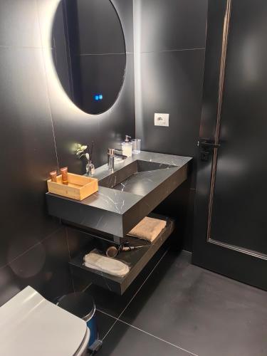 Et badeværelse på Duplex Lungomare Suites