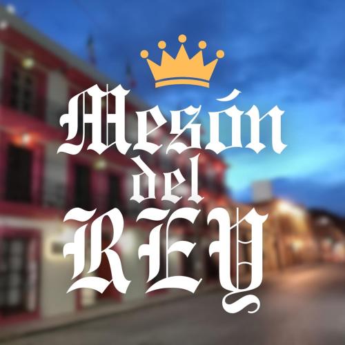 a white sign with a crown on top of it at Hotel Mesón del Rey in Oaxaca City