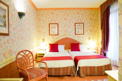 Ένα ή περισσότερα κρεβάτια σε δωμάτιο στο Hotel Milano Regency